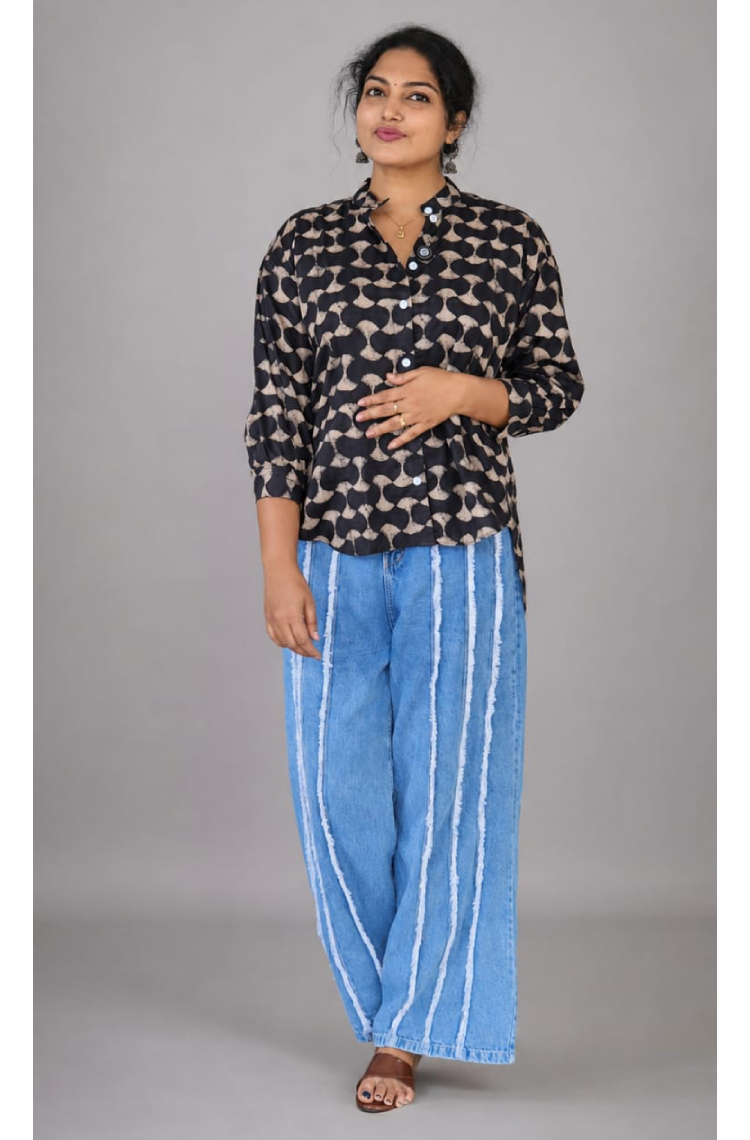 Black cotton shirts by MIZHI, featuring a comfortable fit and classic design, displayed on a flat lay.