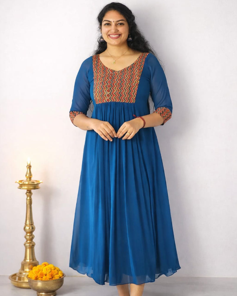 Blue Georgette A-Line pleated dress by MIZHI featuring elegant flowy fabric and a flattering silhouette.
