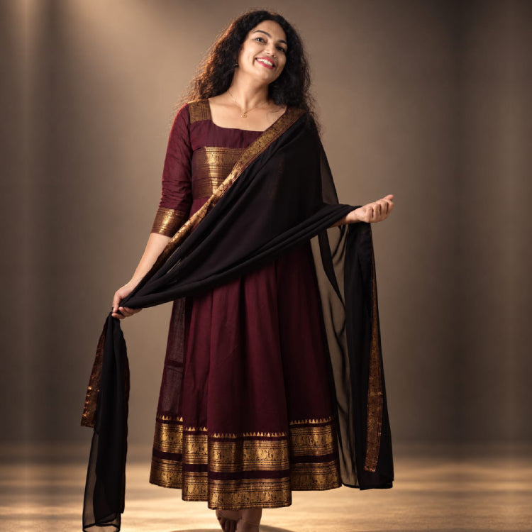Elegant MIZHI Kanji cotton Anarkali with matching dupatta featuring intricate embroidery and traditional design.