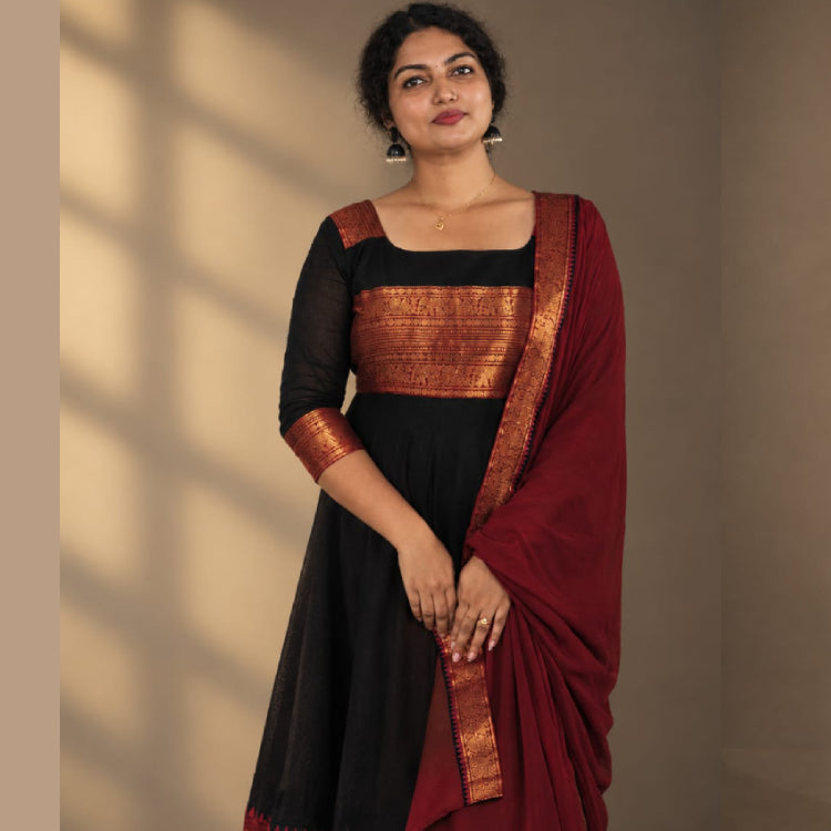 Elegant Kanchi cotton salwar set by MIZHI featuring a traditional design with a matching dupatta and intricate embroidery.