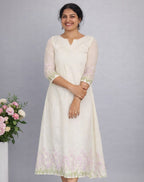 Lavender embroidery theme kurti in mul chanderi fabric by MIZHI, featuring intricate embroidery and a traditional design.