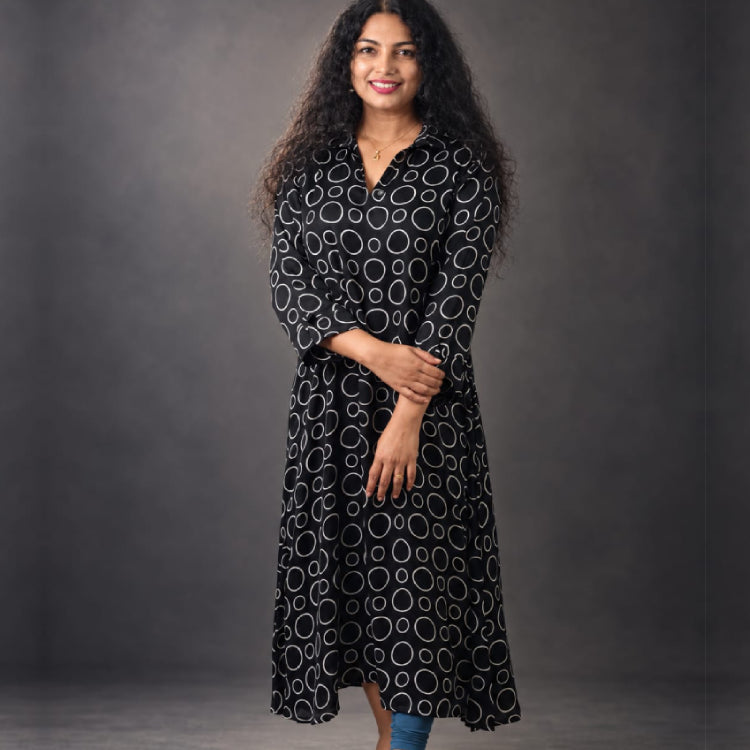 MIZHI black modal silk top featuring smooth, lightweight fabric with a relaxed fit and elegant drape.