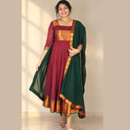 MIZHI Narayanpet umbrella flared Anarkali dress in vibrant traditional fabric, featuring intricate patterns and flowing silhouette.