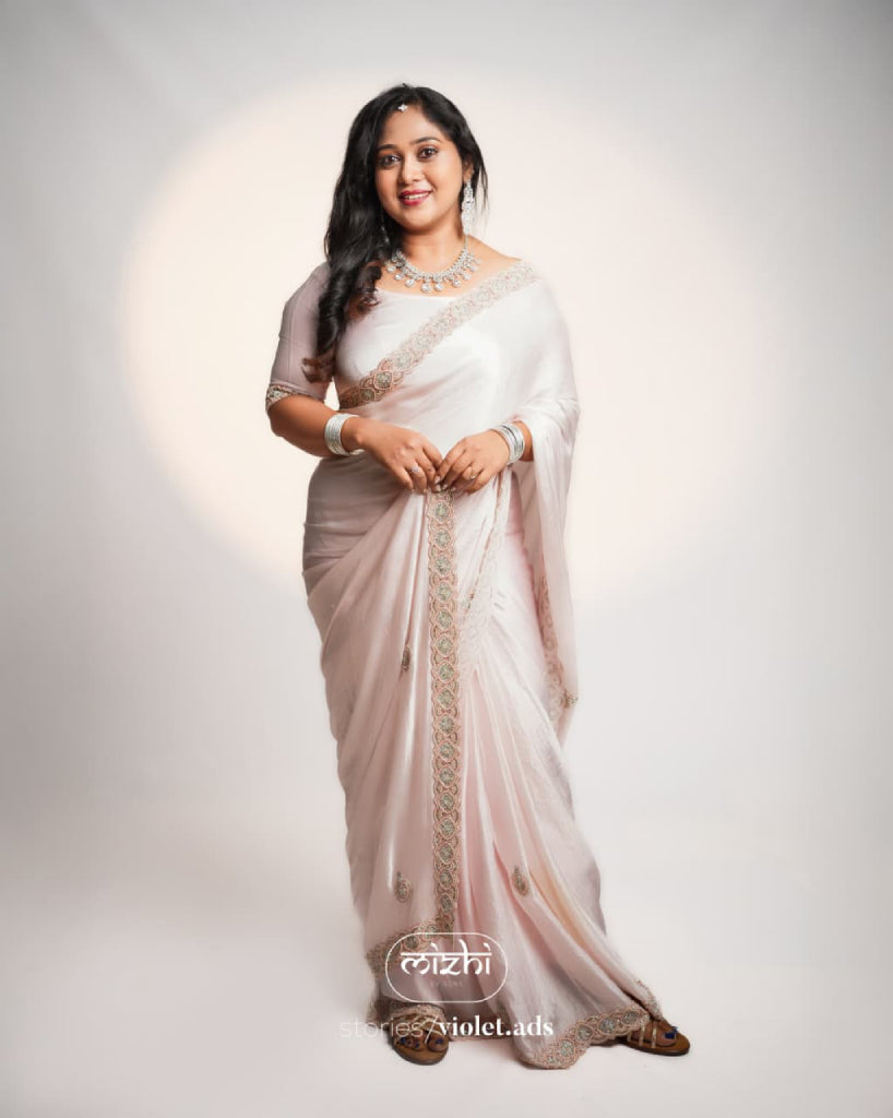 Pastel pink partywear saree
