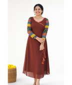 Rust brown Aline dress by MIZHI with multi sleeves in traditional Ajrakh print, showcasing intricate fabric details.