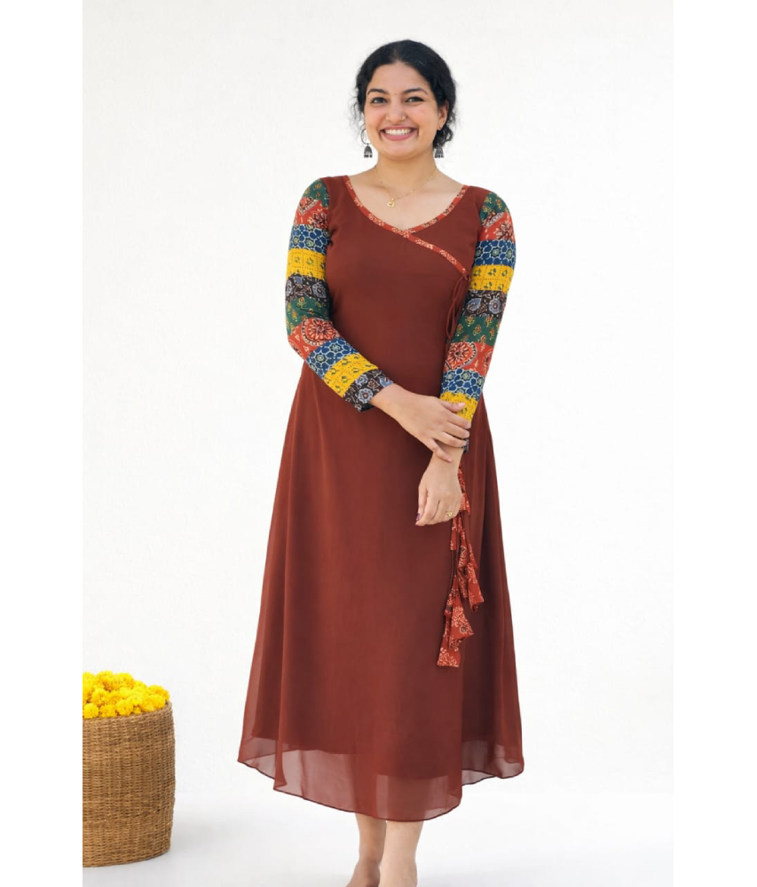 Rust brown Aline dress by MIZHI with multi sleeves in traditional Ajrakh print, showcasing intricate fabric details.