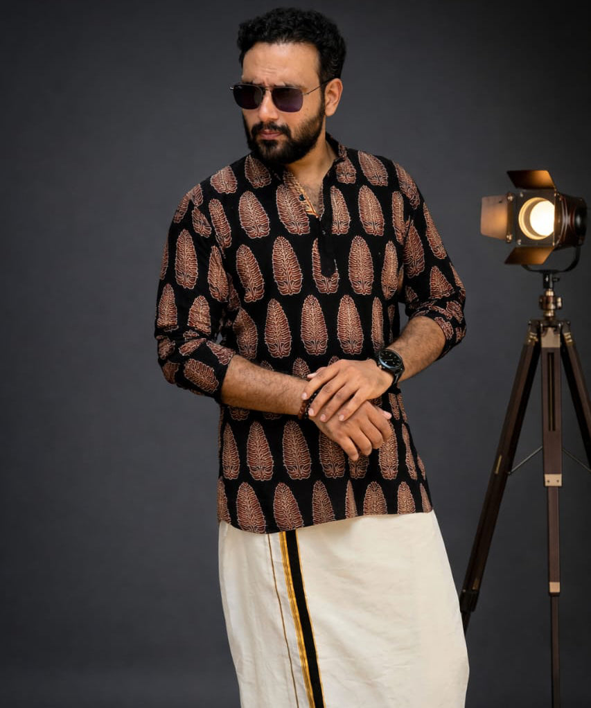MIZHI ajrakh cotton kurta with intricate traditional block print in earthy tones, showcasing detailed ajrak design on lightweight fabric.