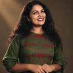 Green cotton A-line kurti from MIZHI featuring an elegant design and flattering A-line silhouette, perfect for casual or festive wear.