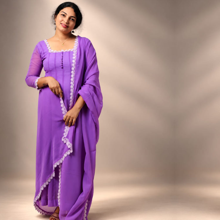 Lavender paneled Anarkali dress in georgette fabric by MIZHI, featuring intricate panel design and elegant flow.