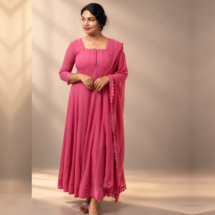 Pink paneled Anarkali in georgette fabric by MIZHI, featuring intricate embroidery and flowing silhouette for traditional elegance.