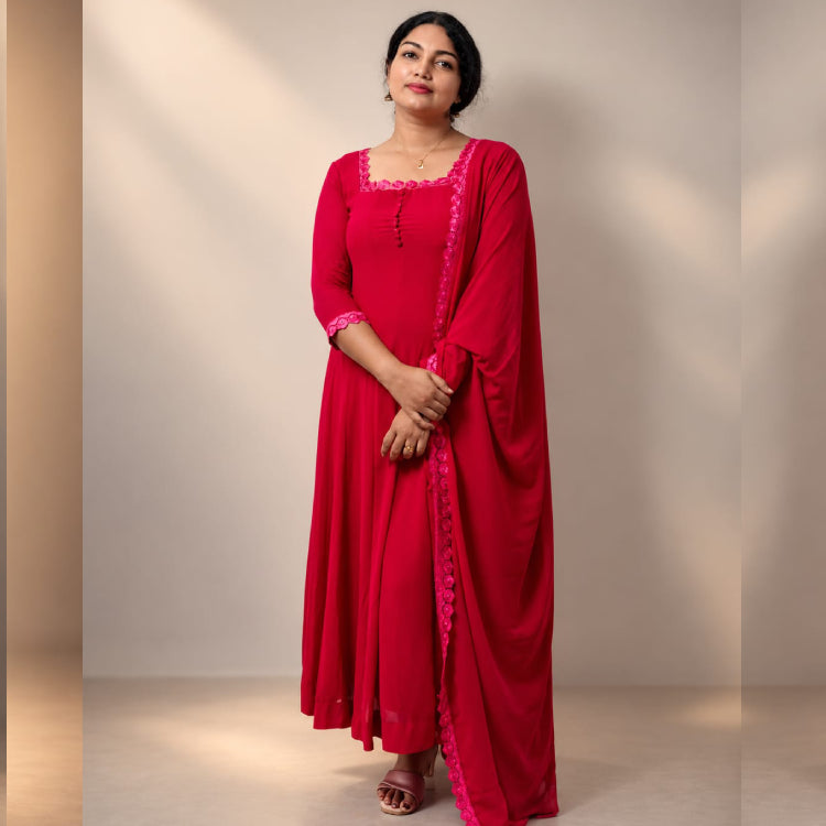 Red paneled Anarkali dress in georgette fabric featuring intricate embroidery, designed by MIZHI.