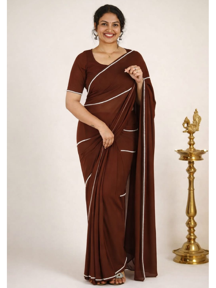Beadwork saree from MIZHI featuring intricate bead embroidery on elegant ready-to-wear Indian saree.