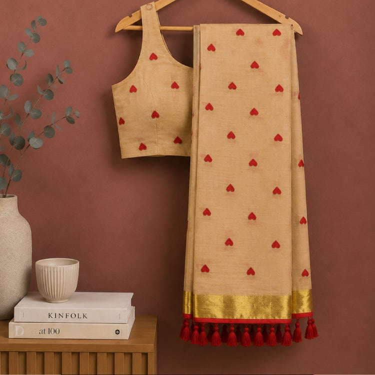 Beige Mul Cotton Saree with Red Heart Motifs & Gold Zari Border
