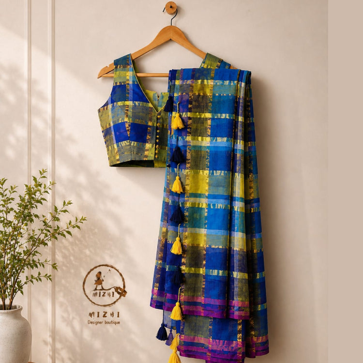 Royal blue and lime yellow checked mul cotton saree by MIZHI, featuring vibrant colors and traditional design.