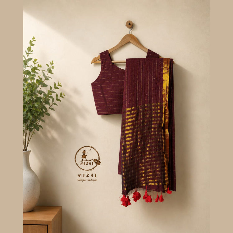 Brown checked Mul cotton saree by MIZHI featuring a classic pattern and soft, lightweight fabric for casual or festive wear.