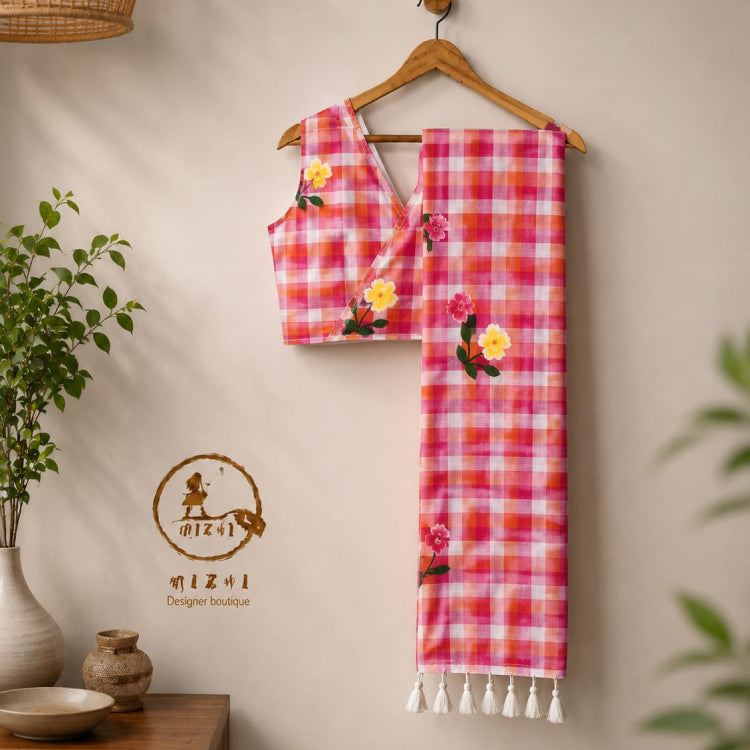 Red Madras check handpainted mul cotton saree by MIZHI featuring traditional checked pattern and vibrant design.
