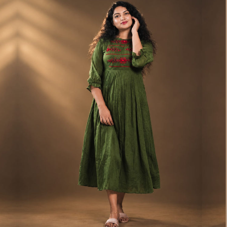 Elegant green cotton A-line kurti by MIZHI, showcasing a stylish and comfortable cotton A-line frock with intricate details.