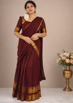 Brown Kanji Cotton Dhavani Set by MIZHI, featuring traditional woven dhavani fabric with intricate patterns.