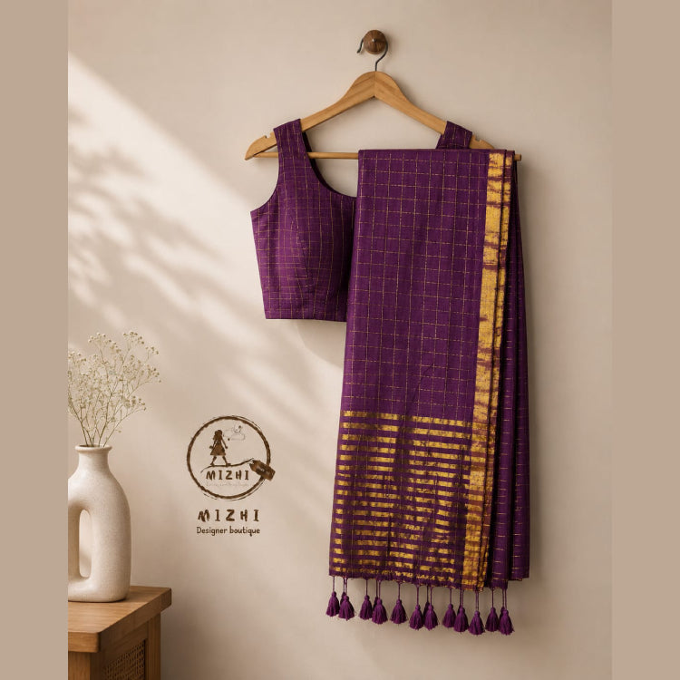 MIZHI checked Mul cotton saree in grape wine color with a classic pattern, showcasing lightweight and breathable fabric for traditional wear.