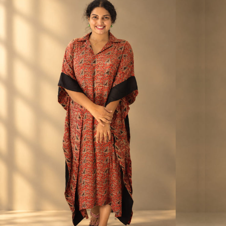 Elegant Ajrakh modal silk kaftan by MIZHI featuring traditional Ajrakh-inspired print and flowing, lightweight fabric.