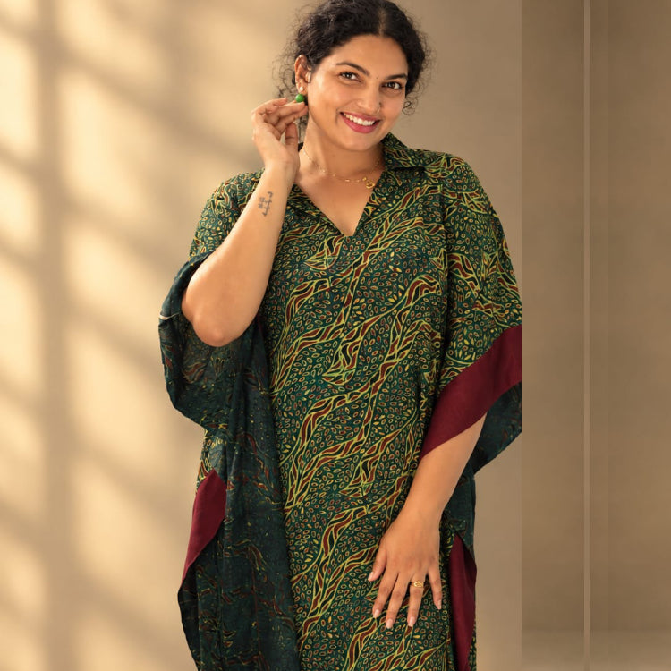 Green Ajrakh Modal Silk Kaftan by MIZHI featuring traditional Ajrakh-inspired print and flowing, elegant design.