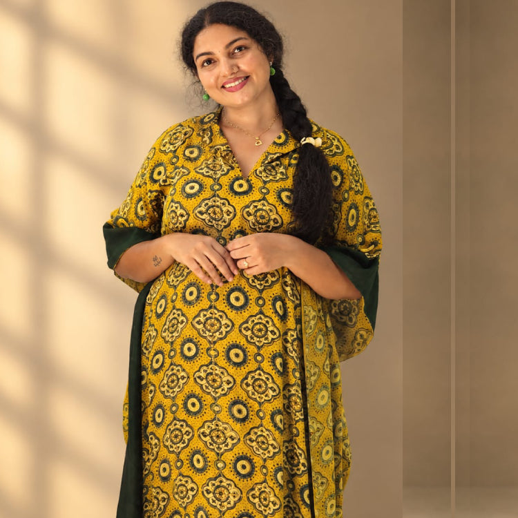 Yellow-green Ajrakh-inspired modal silk kaftan by MIZHI featuring traditional printed patterns.