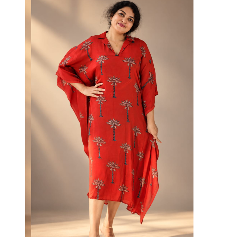Red modal silk ajrakh kaftan by MIZHI featuring intricate traditional patterns and a flowing, comfortable design.