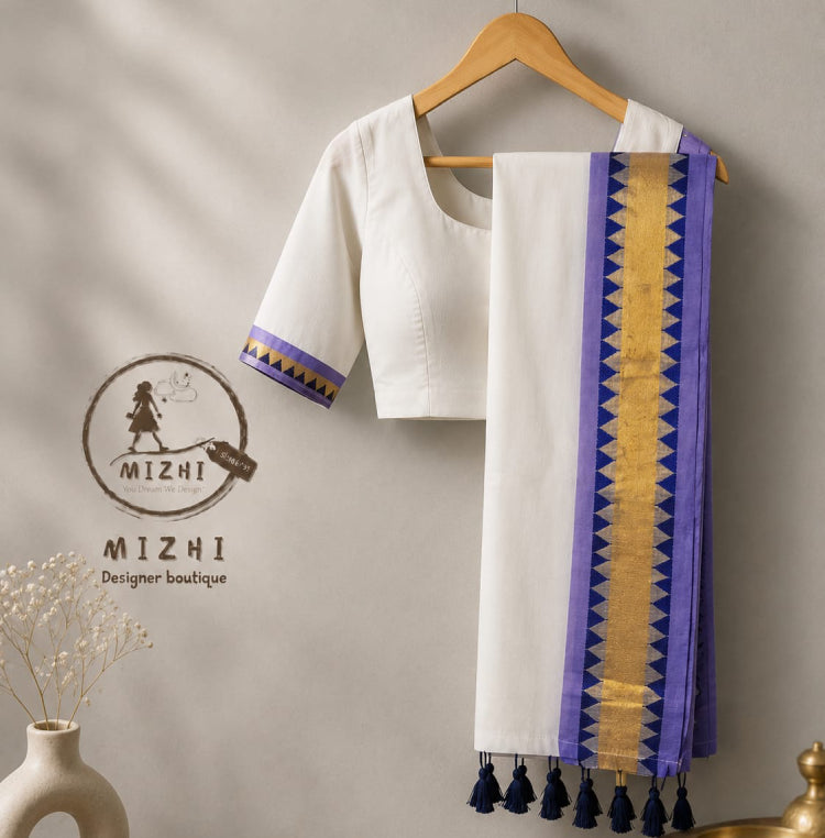 Mul cotton saree by MIZHI featuring a royal purple body with a golden zari border, showcasing traditional Indian craftsmanship.