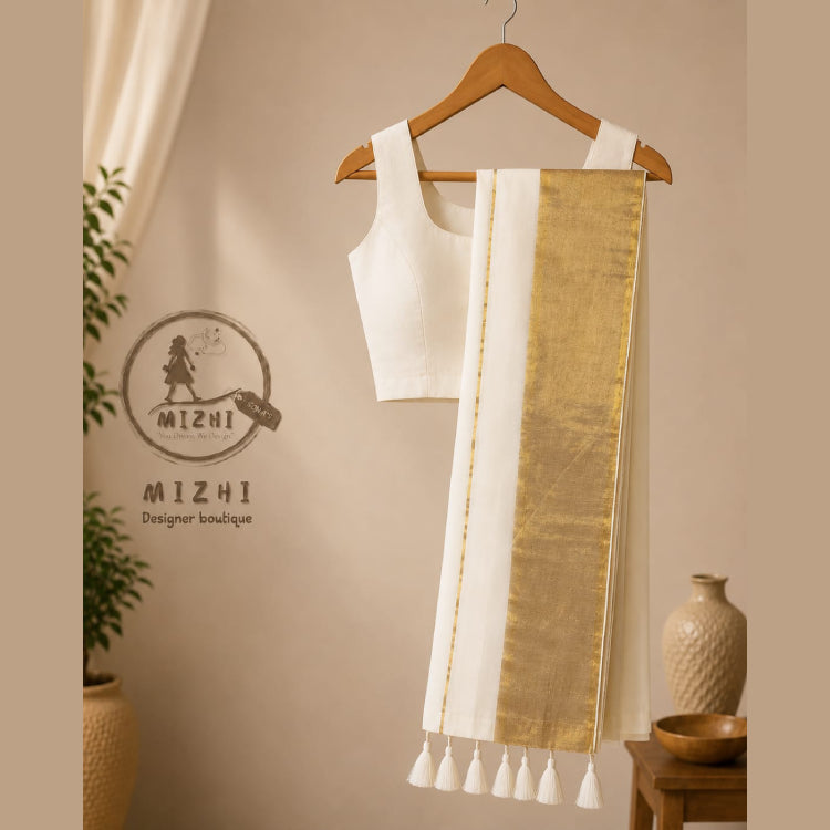 MIZHI Mul Cotton saree with intricate traditional design and soft, lightweight fabric, shown in the image.