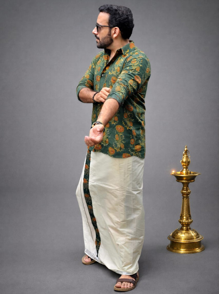 MIZHI traditional mundu and shirt set displayed on a mannequin, featuring a white shirt and matching white mundu.