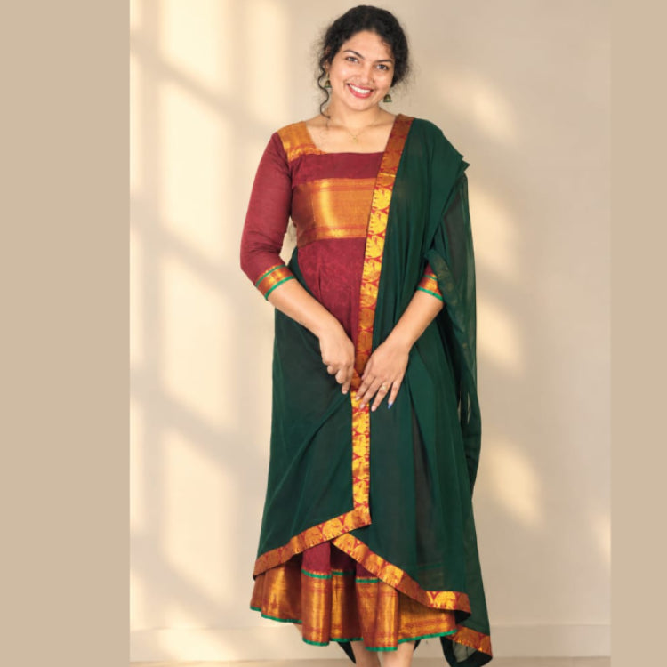 MIZHI Narayanpet umbrella flared Anarkali dress with intricate embroidery and vibrant colors, showcased on a model.