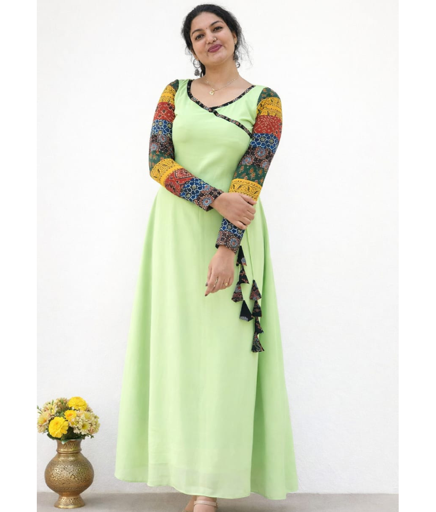 Pastel pistachio MIZHI Aline dress featuring multi sleeves in traditional Ajrakh print on Georget fabric.