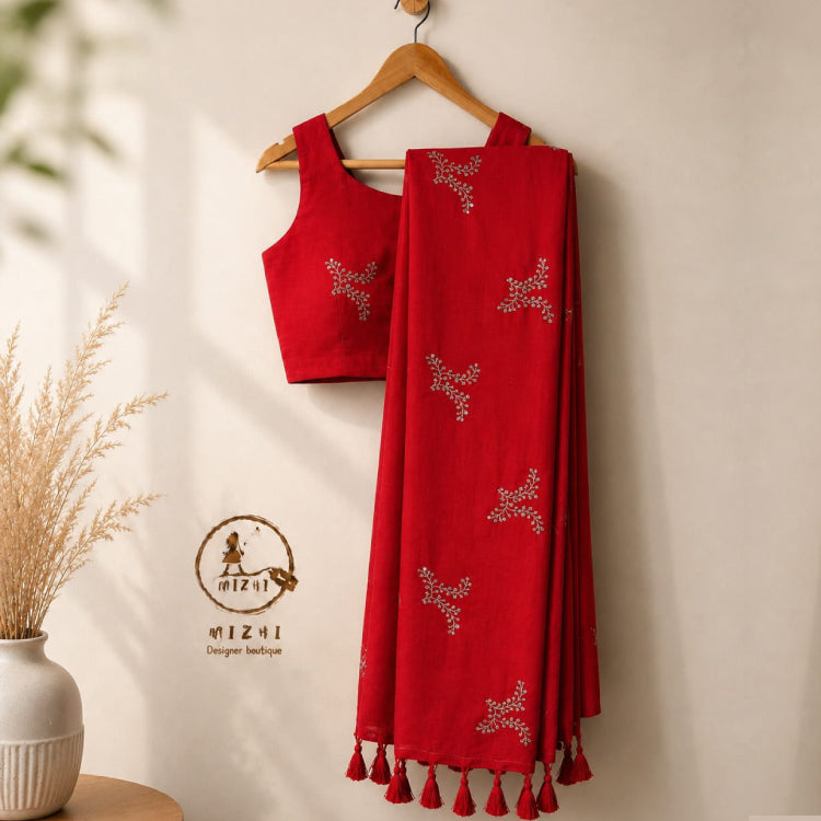 Crimson red embroidered mul cotton saree with intricate designs, traditional style, by MIZHI, shown in the image.