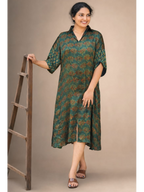 Green Ajrakh shirt collar kurti by MIZHI with intricate traditional print and a relaxed fit, shown on a hanger.