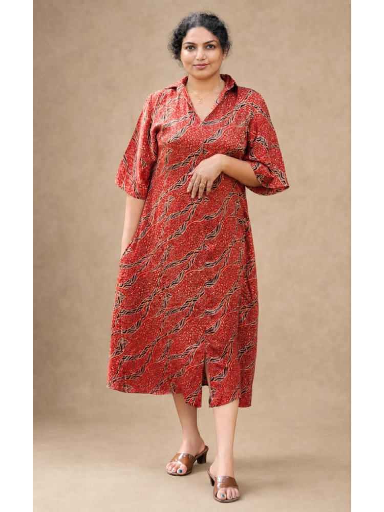 MIZHI Ajrakh shirt collar kurti with traditional geometric print, featuring a relaxed fit and vibrant colors.