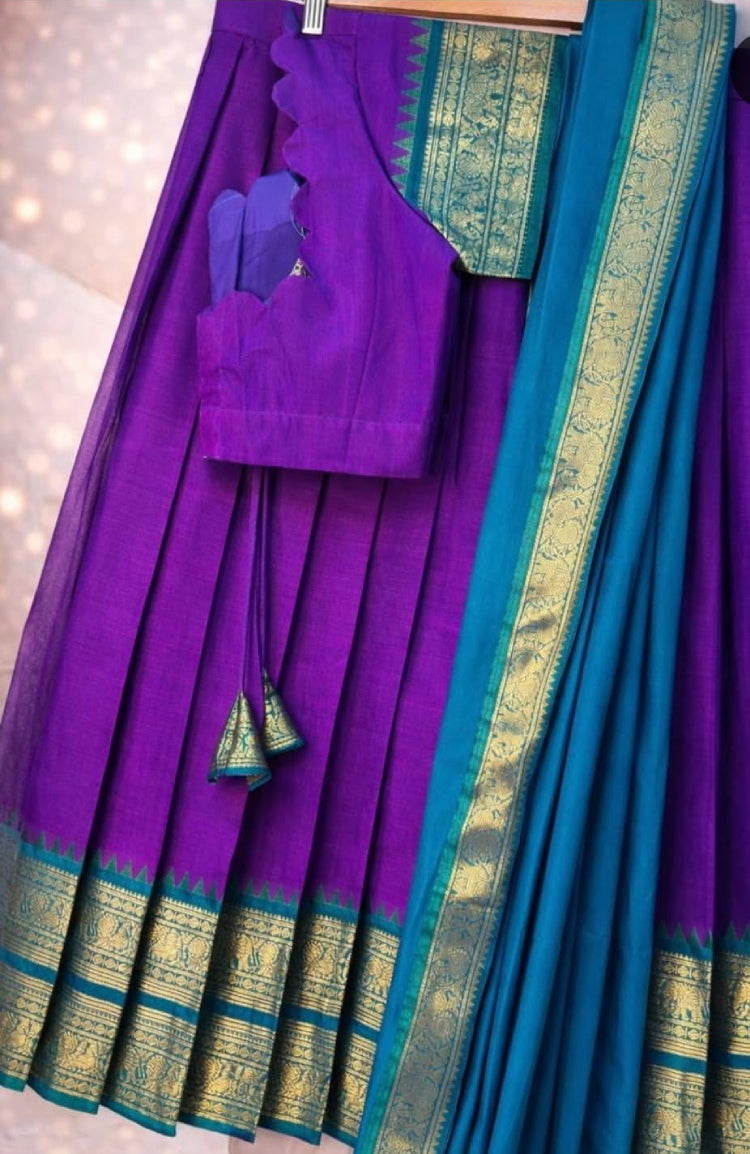 MIZHI fully stitched dhavani skirt with matching blouse, traditional Indian ethnic wear, shown in stitched fabric.