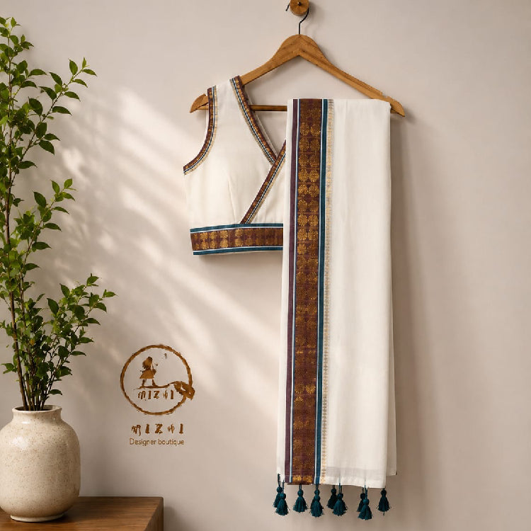White Mul Cotton Saree with traditional copper border by MIZHI, showcasing intricate border design and lightweight fabric.