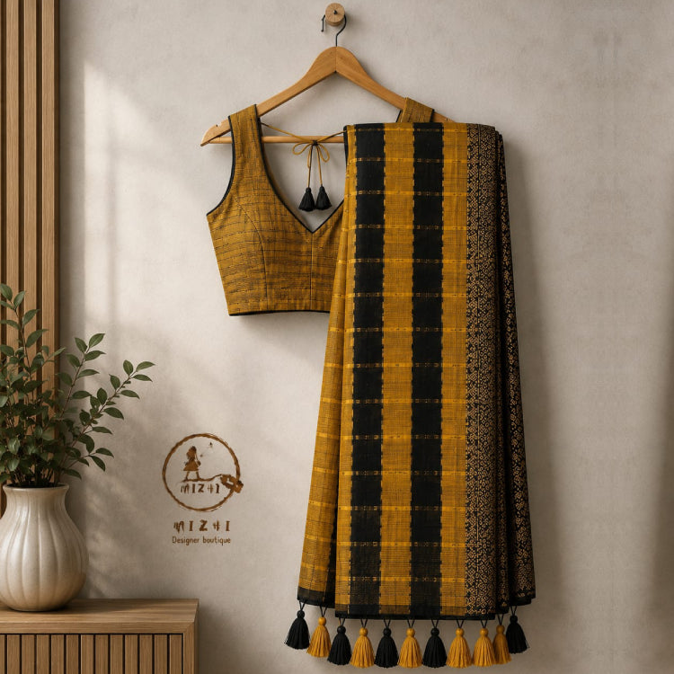 Mustard yellow and black checked mul cotton saree by MIZHI, showcasing traditional design with vibrant color and classic pattern.