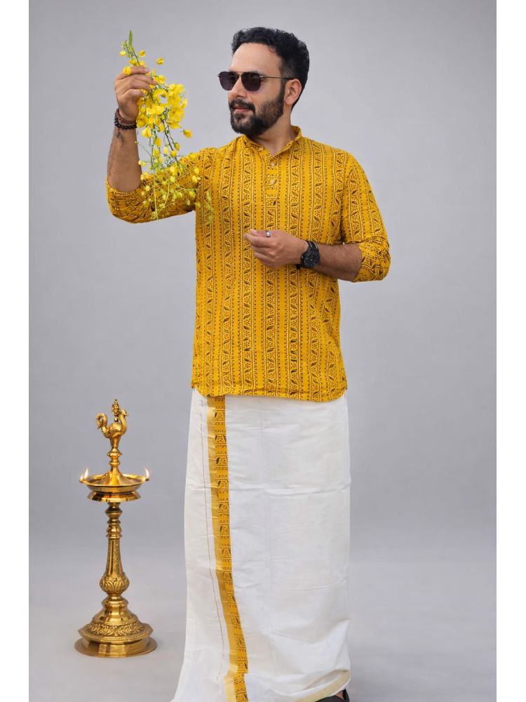 Yellow Vishu special mundu and kurta set by MIZHI, featuring traditional fabric and intricate design for festive occasions.
